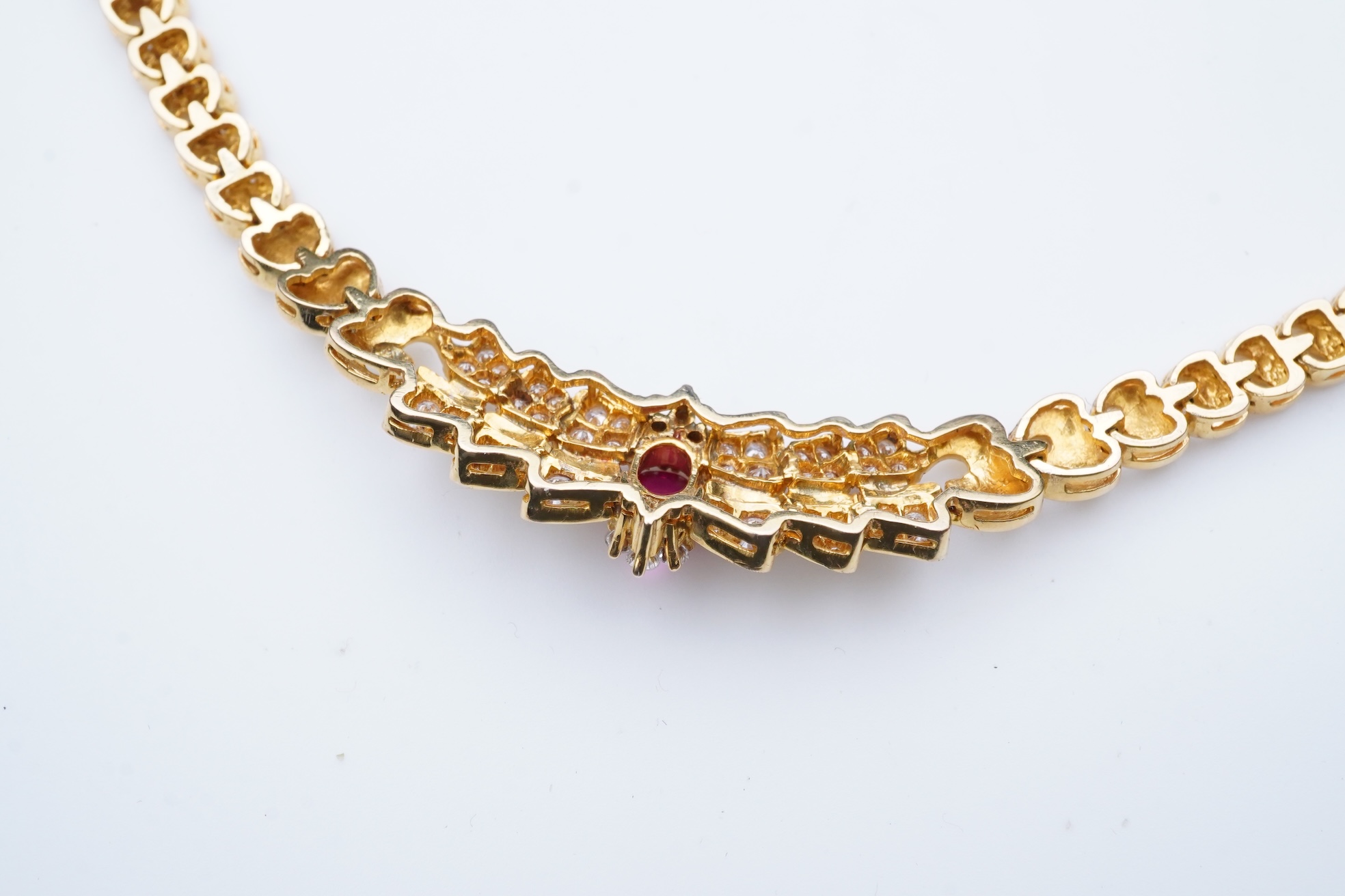 A diamond and synthetic ruby necklace